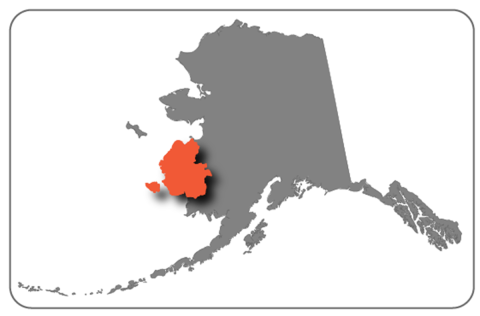 The shape of the state of Alaska with the highlighted portion of the Yukon-Kuskokwim Delta designated as the Yukon Delta National Wildlife Refuge on the western-middle edge of the state.