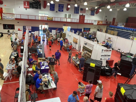 Aerial view of event booths set up in gym