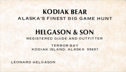 A business card on weathered paper with text: Kodiak Bear Alaska's Finest Big Game Hunt. Helgason and Son. Registered Guide and Outfitter. Terror Bay, Kodiak Island, Alaska 99697. Leonard Helgason.