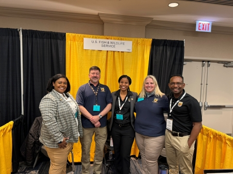 Five U.S. Fish and Wildlife Service representatives at a career fair