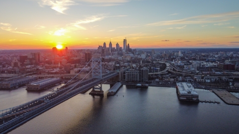 the skyline of the city of Philadelphia taken from the Delaware River with the sun 