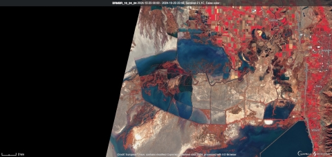 A satellite image depicts water conditions on the refuge shown in an aerial view with areas of water clearly visible.