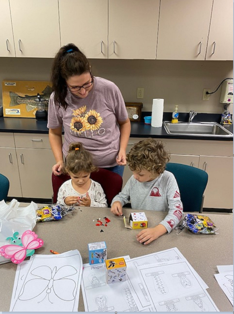 Two children making crafts 