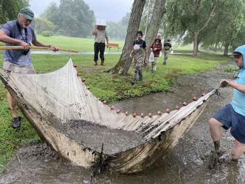 Rainy/muddy net seine work in pond and slow moving waterways to reduce invasive species, capture broodstock, or perform population inventories associated with endangered species like Barrens Topminnows