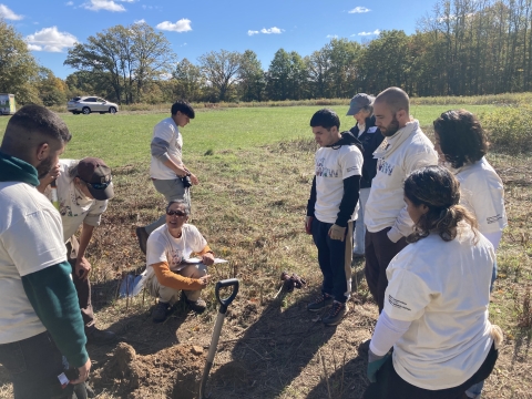 A group learns about soils and plantings at the Great Swamp NWR