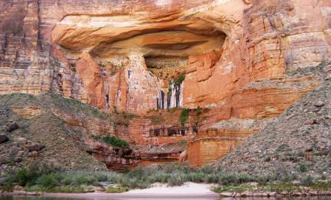 A geologic rock formation above a body of water