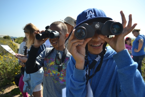 Young children birding at San Diego Bay National Wildlife Refuge