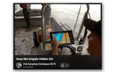 Retrieval in moderate current, hidden set, no float, small hoop net boat maneuvering by driver, grappling technique