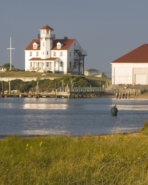 Fisherman near the channel across from the Coast Guard Station