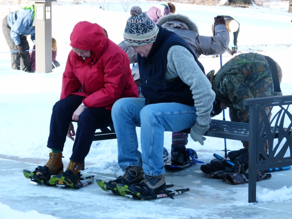 Snowshoers preparing to trek into the snow