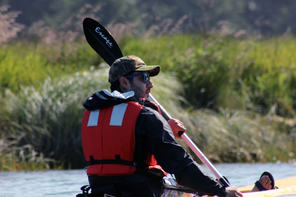 A kayaker in Siletz Bay Estuary