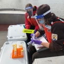 Biologists prepare tubes for water samples during an eDNA sampling event.