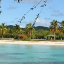 Caracas beach ocean view with bright blue sky and clear blue waters