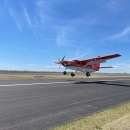 airplane coming in to land on a runway