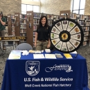 Wolf Creek National Fish Hatchery table at Read Across Russell County event 