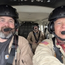 selfie of three people in an airplane