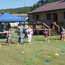 children participating in lawn fishing at the hatchery outdoor adventure