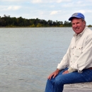 Regional Director Charlie Wooley on a dock at Green Bay National Wildlife Refuge