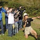 students learn to use binoculars with a guide