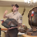 Refuge Employee talks to a group about wild turkey hunting