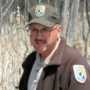 Photo of Jim Hazelman in a USFWS uniform