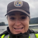 Refuge employee in uniform smiling