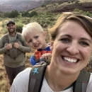 Photo of Mallory and family hiking in Colorado