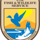 USFWS Logo with blue fish jumping out of water below a blue duck with the text U.S. Fish & Wildlife Service, Department of the Interior