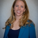 Alison Stewart smiles in a portrait headshot