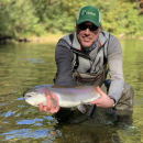 Matt Filsinger holding large trout. 