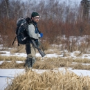a man in the snow with gear