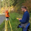 David Hines, Geographer at the CRFWCO, working with surveyor equipment