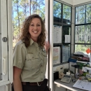 Valerie in an entrance booth