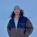 man standing in the snow