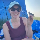 Aimee Weldon holding Saltmarsh Sparrow