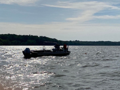 Silhouette of a boat on a lake