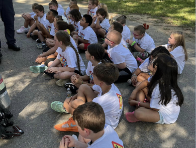 Students listening to a speaker