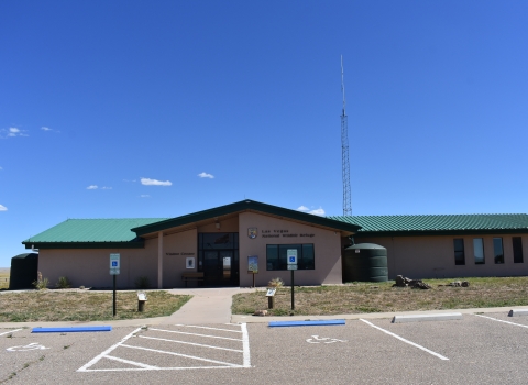 Las Vegas National Wildlife Refuge Visitor Center, peach building with a green roof