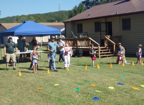 children participating in lawn fishing at the hatchery outdoor adventure