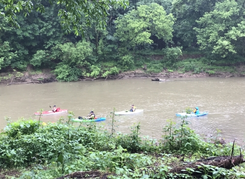 Four kayakers on the West Fork River, WV