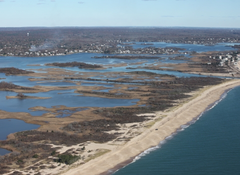 Aerial view of coastal barrier beach. 