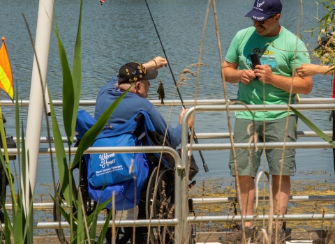 Veteran in wheelchair catches fish