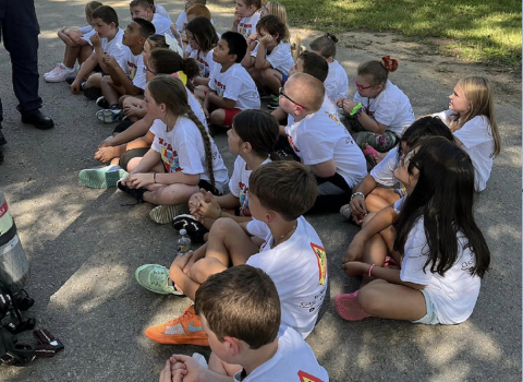 Students listening to a speaker