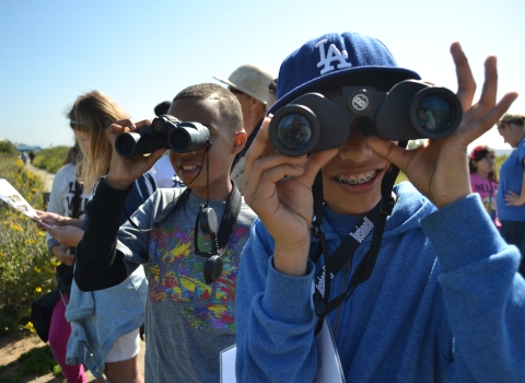 Young children birding at San Diego Bay National Wildlife Refuge